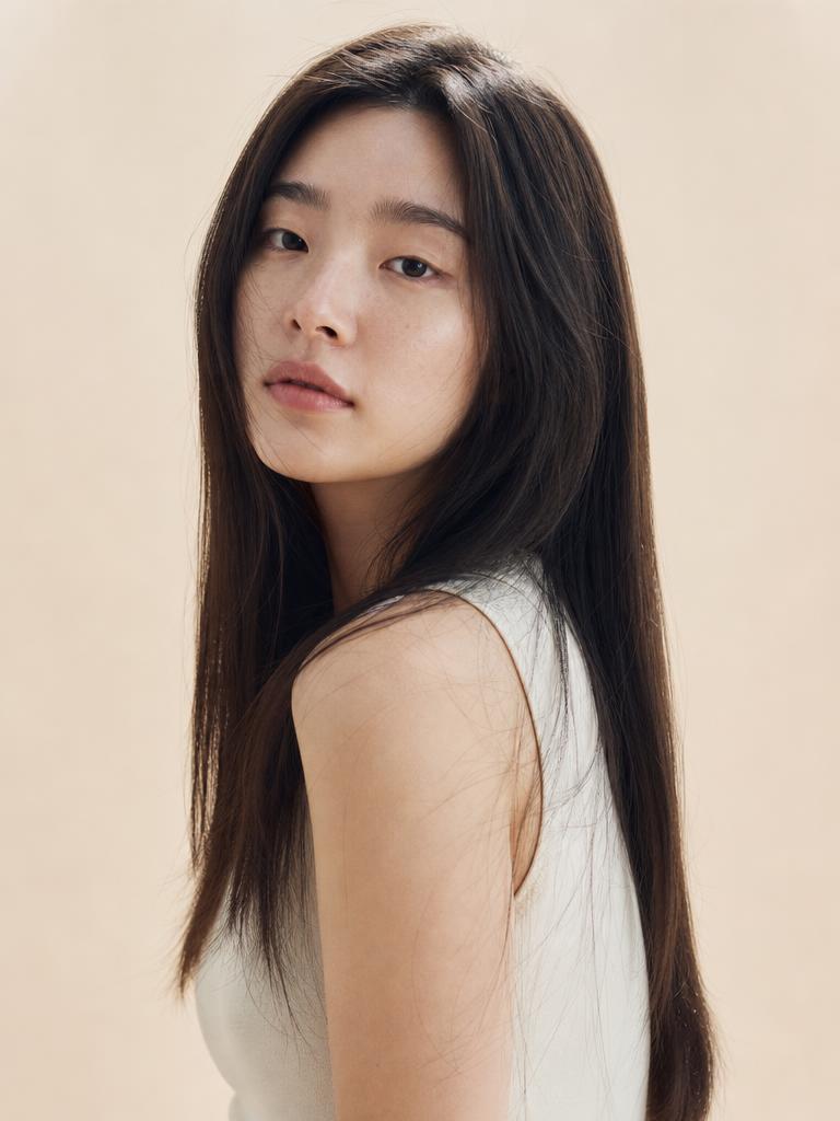Portrait of a woman with long straight hair